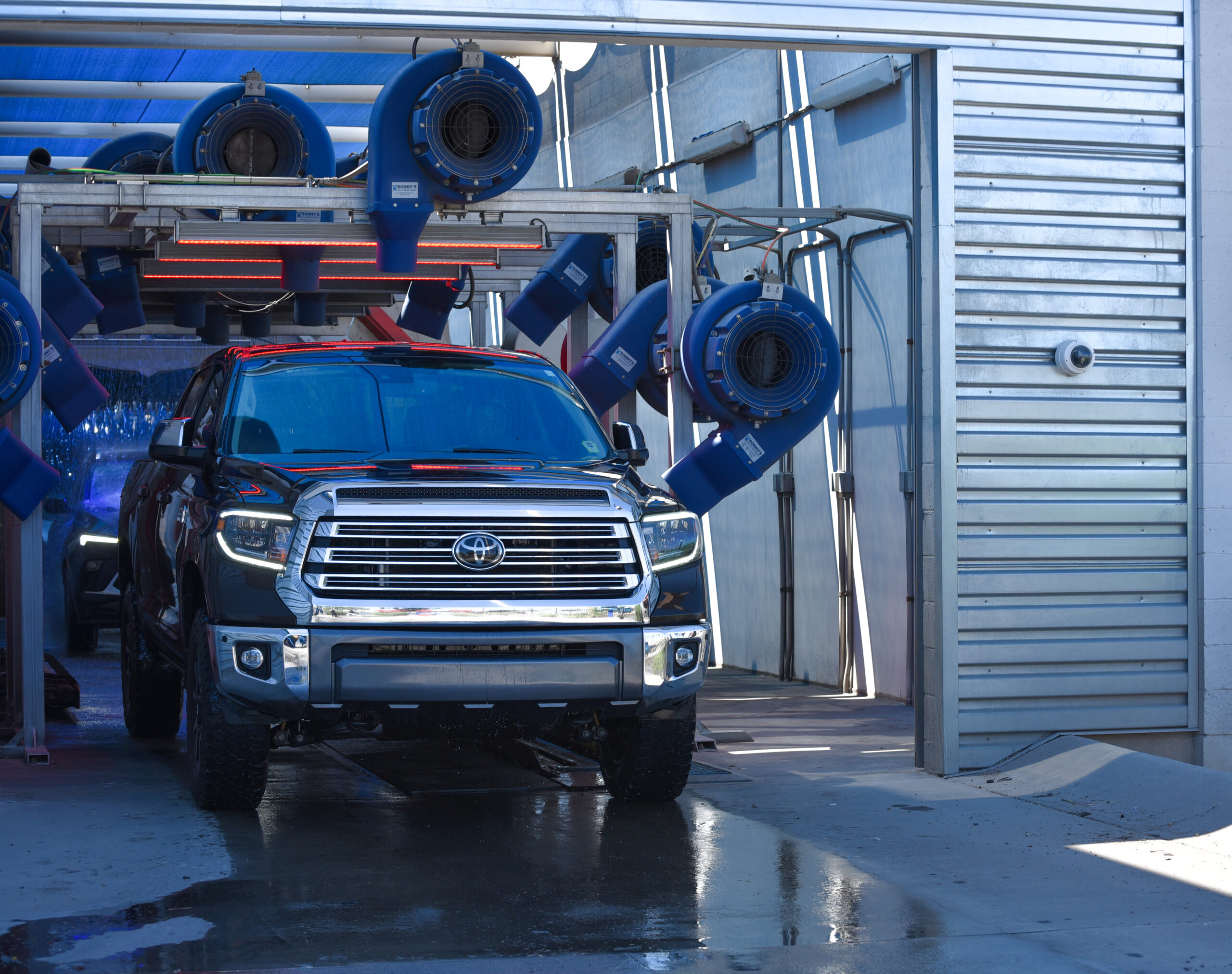 Car being dried by blowers